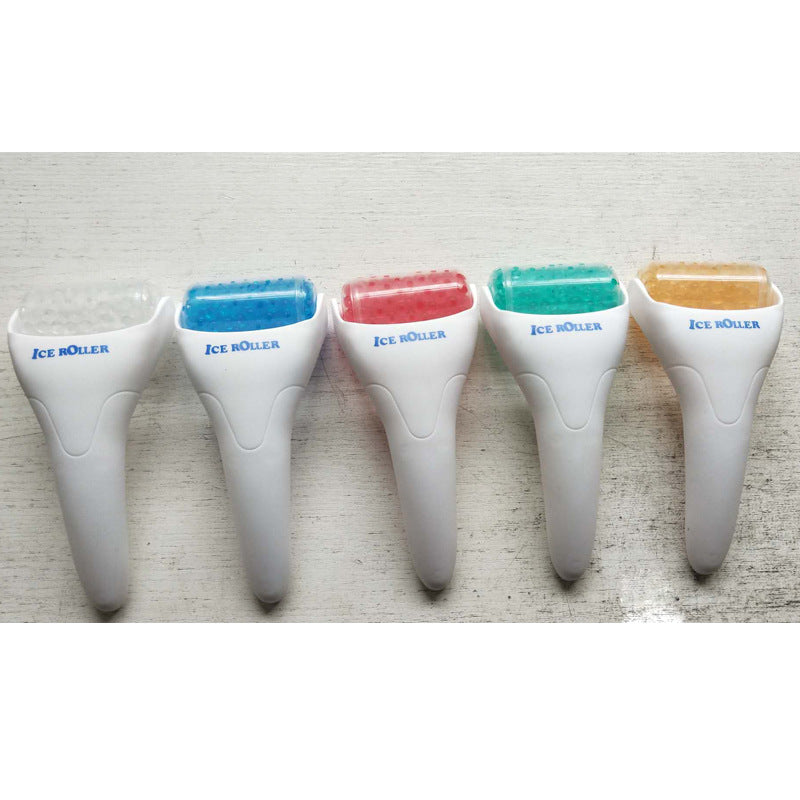 Blue ice roller for cooling facial massage, side angle